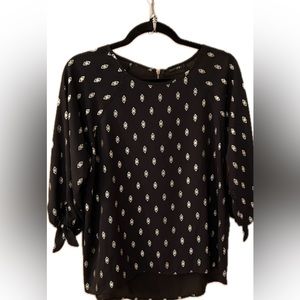 Black blouse with gold accent